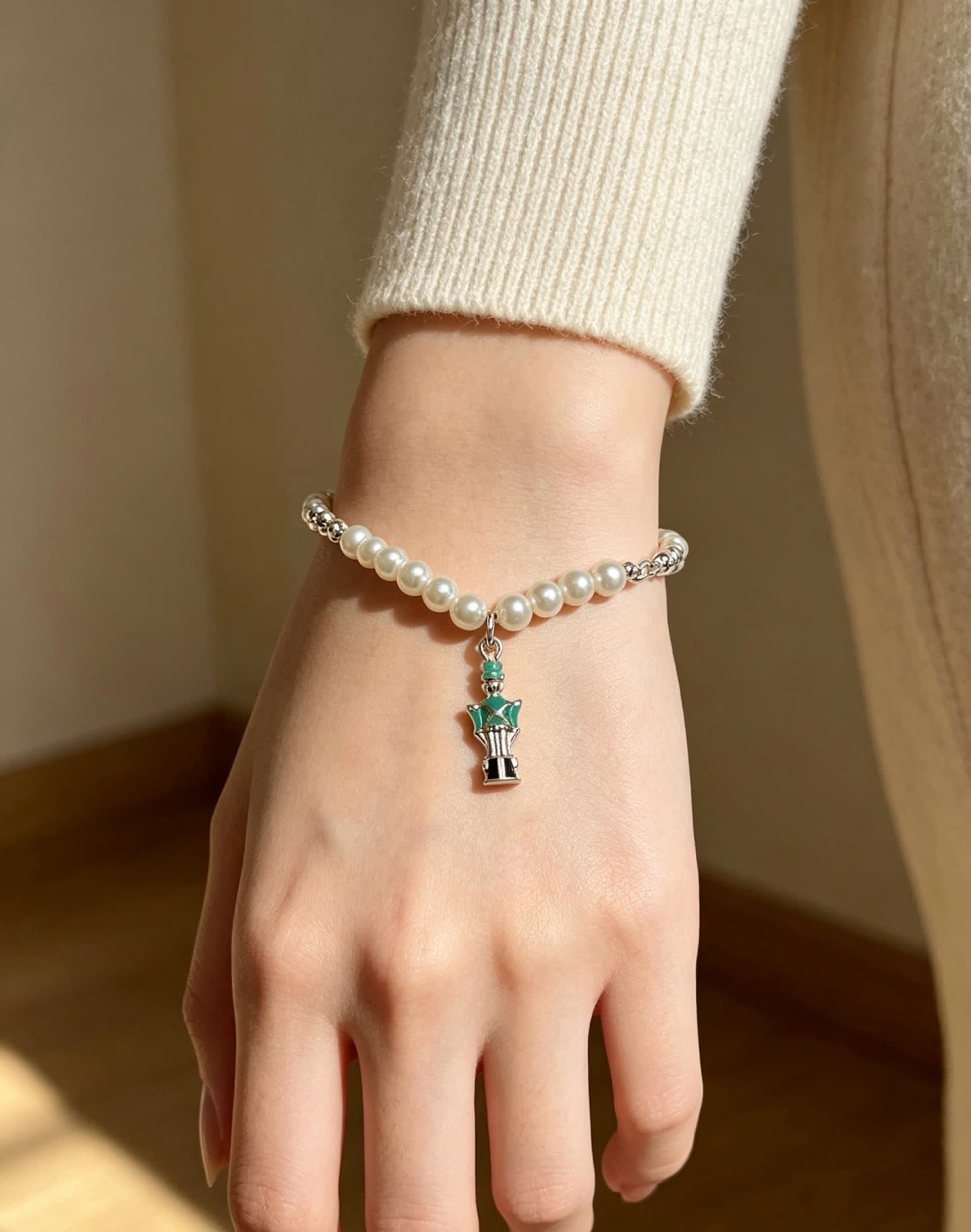 Tiffany & Co. Pearl and Bead Bracelet with Green Enamel Charm
